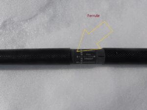 Close-up of a black female connector on a cable.