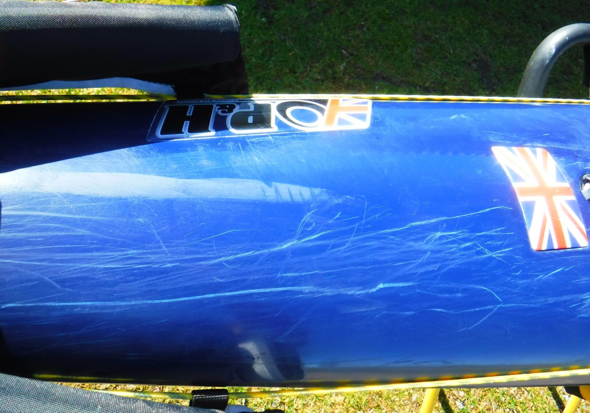 the front deck of a kayak with cosmetic scratches