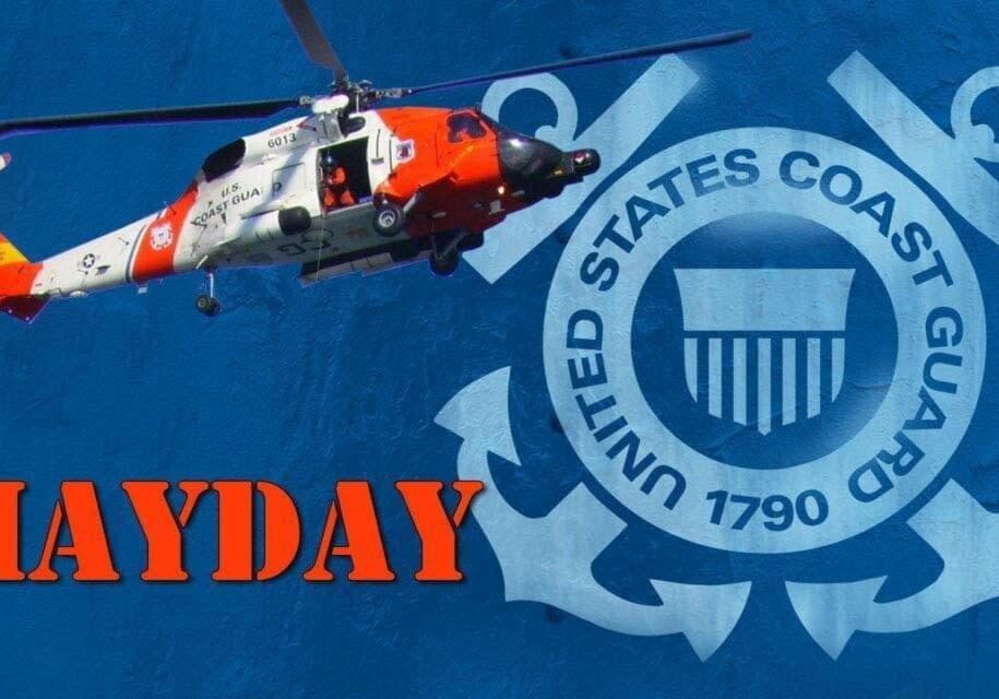 a coast guard helicopter with the USCG logo